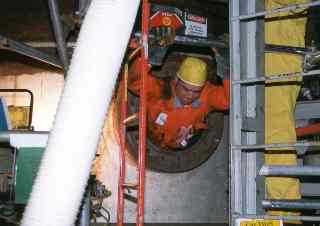 Demo worker climbing out of the steam generator