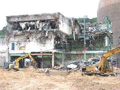 Control building being torn apart by excavators