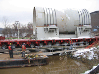 Pressure vessel being loaded onto the barge