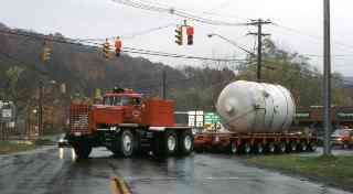 The truck departing with the dome loaded onto the trailer